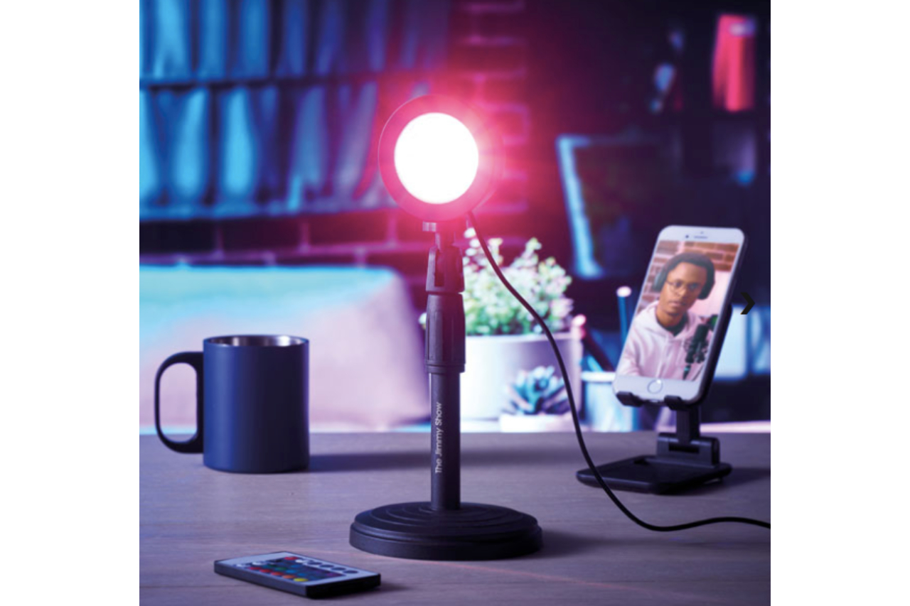 <p>The Midocean sunset projector lamp includes a USB charging cable, a stand and a remote control</p>
