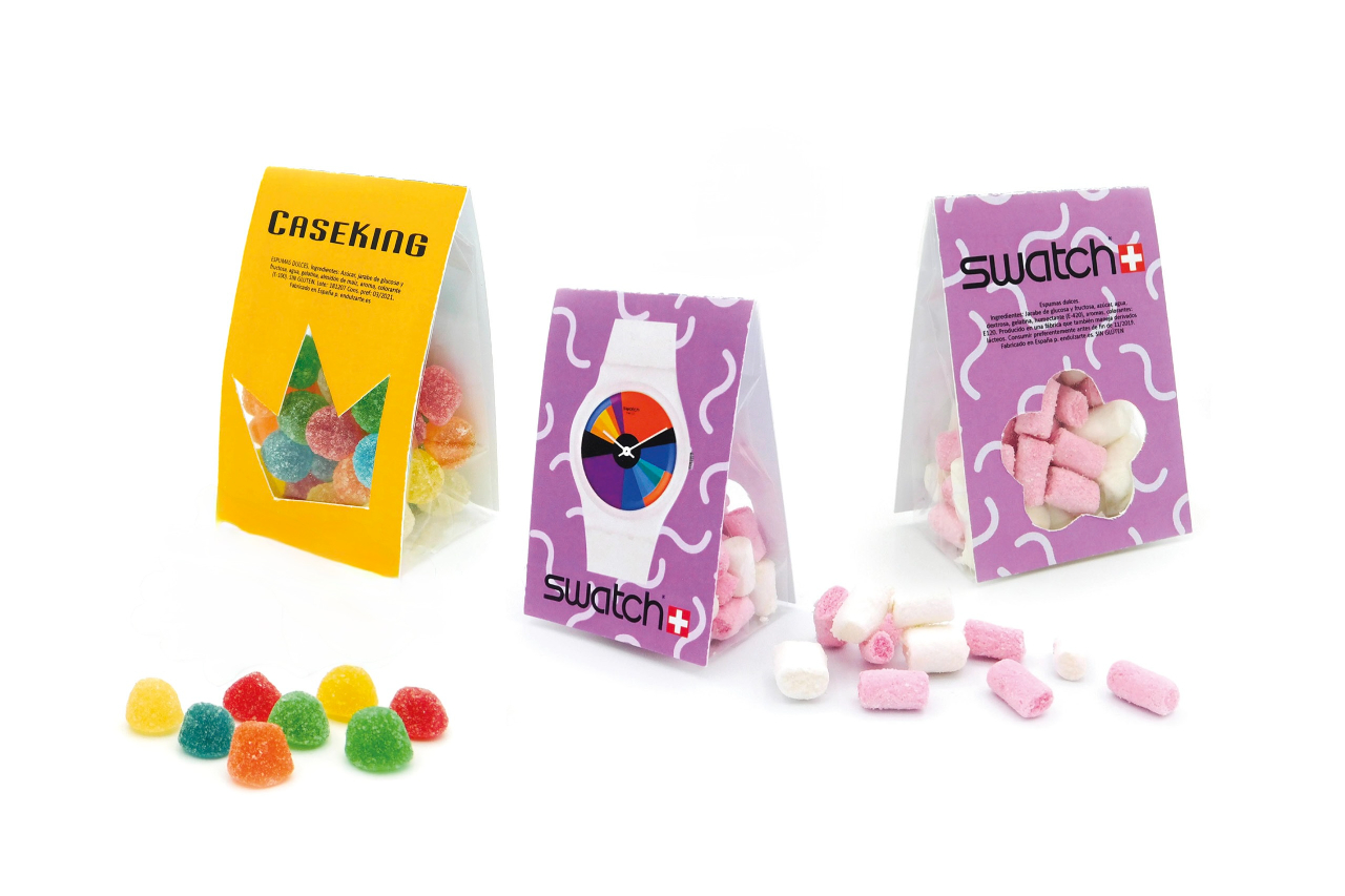 <p>Happy Bags, pouches of mini marshmallows or fruity gummy gems, wrapped in colorful cardboard with custom-shaped windows. From Creativity Center's offerings.</p>